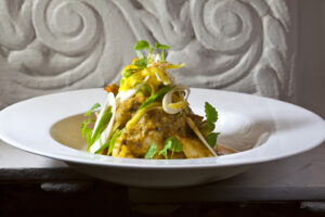 Garlic & Kefir Scented Tiger Shrimp with Thai Curry Sauce and Hearts of Palm Salad by Executive Chef Ashfer Biju
