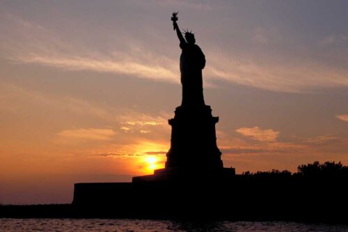 Statue of Liberty at sunset. Photo by Battman.
