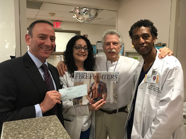 Battman with Burn Center staff.