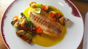 Sea Bass Loup de Mar, Mussels, Bak Choy and Coconut Curry by Chef Suzanne Cupps. Photo by Battman.